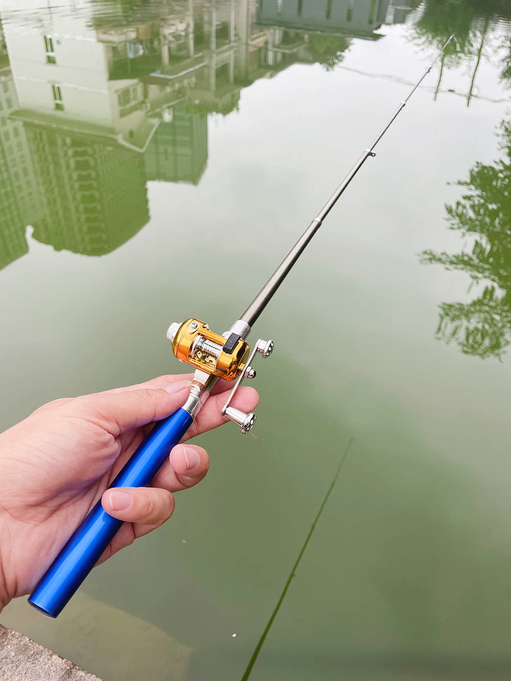 Mini Telescopic Pocket Pen Fishing Rod Pole + Reel